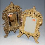 A brass Rococo Revival easel dressing table mirror; together with a gilt metal matching photograph