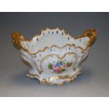 A Limoges porcelain planter in the Rococo taste, decorated with floral sprays, w.34cm