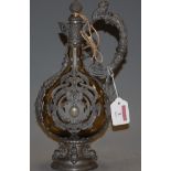 A Continental pewter on glass pedestal ewer and stopper, h.29cm