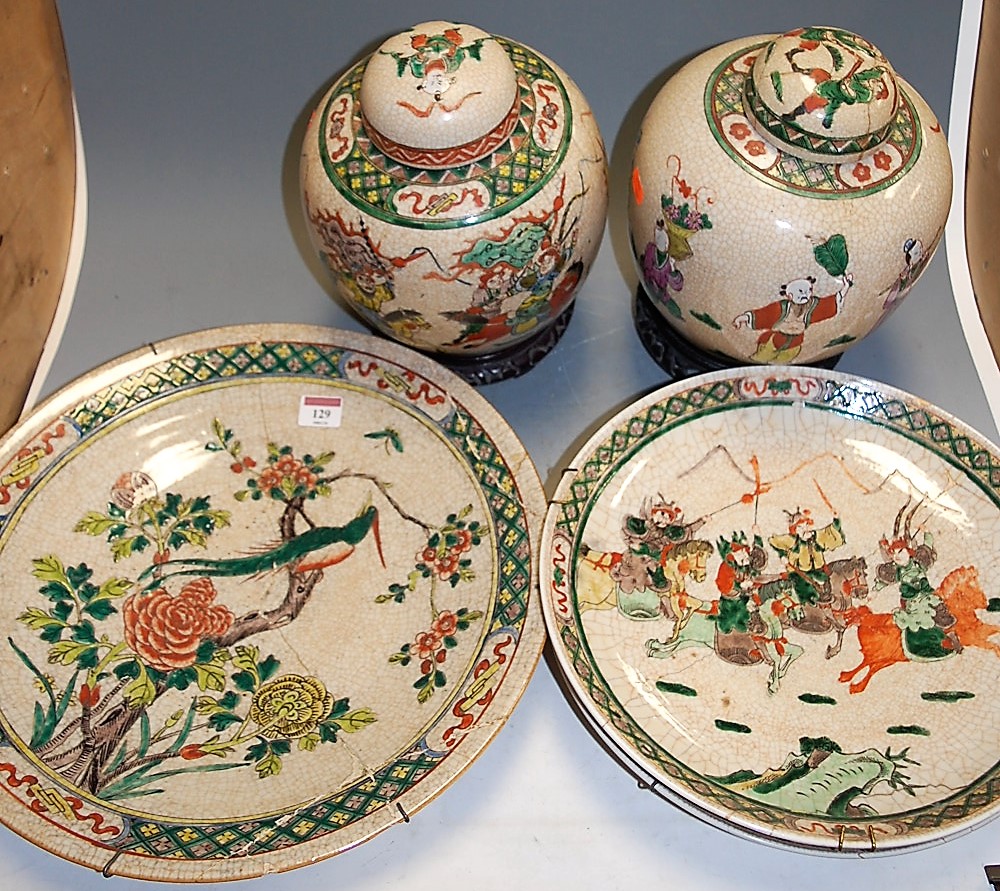 A quantity of Chinese famille rose decorated crackle glazed earthenwares, comprising pair of