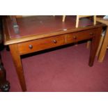 A Victorian mahogany and rexine inset two drawer writing table, width 121cm