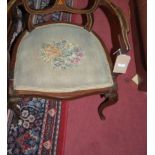 An Edwardian mahogany, rosewood and floral bone inlaid open elbow chair