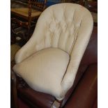 A Victorian mahogany framed and buttoned upholstered tub nursing chair