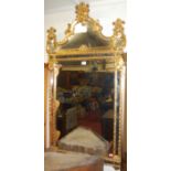 A contemporary gilt framed arch top marginal wall mirror in the Georgian taste 125x65cm