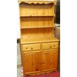 A modern pine kitchen dresser, width 94cm