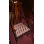 An Edwardian mahogany and satinwood strung slatback open elbow chair