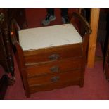 An Edwardian walnut three drawer music stool, w.54cm