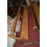 A late Victorian stained pine long church pew, length 283cm