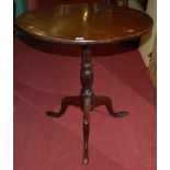 A George III mahogany circular pedestal tripod table, dia. 71.5cm