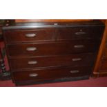 A 1930s stained walnut chest of two short over three long drawers, w.106cm