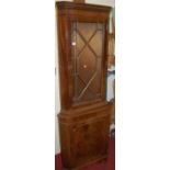 An antique elm single door hanging corner cupboard, together with a reproduction mahogany