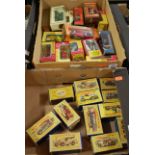Two trays containing a large quantity of mixed boxed Matchbox Models of Yesteryear to include