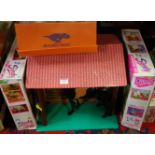 A quantity of boxed modern release Sindy boxed action figures and accessories to include stable