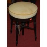 A 19th century mahogany circular music stool