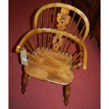 A childs' elm splatback Windsor chair, having crinoline stretcher, w.46cm