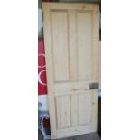 A Victorian pine four panel interior door, 198x76cm