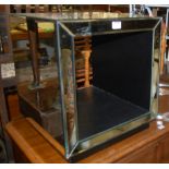 A contemporary mirrored Cube occasional table; together with a polished chrome and glass inset