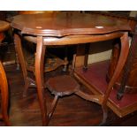 An Edwardian walnut shaped top occasional table