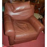 A contemporary Multiyork tan leather three piece suite comprising; three seater sofa and pair of