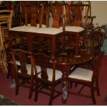 A contemporary mahogany dining suite comprising; D-end dining table having pull-out action (