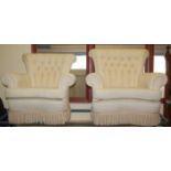 A contemporary cream floral upholstered buttonback three-piece suite, comprising three-seater