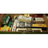 Two boxes containing a quantity of boxed and loose diecast to include Corgi, Vanguards, Ertl, and