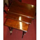 An early 20th century mahogany nest of three occasional tables, width of largest 51cm