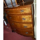 A contemporary mahogany and crossbanded bowfront chest of four long drawers, w.92cm