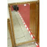 A 19th century gilt framed rectangular wall mirror, having a rope twist border, 86x49cm