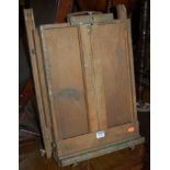 A mid 20th century beech travelling artist's easel