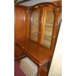 A mid-Victorian oak round cornered hallstand, having turned brass hooks (one replaced and another