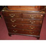 A George III oak chest of two short over three long graduated drawers, w.89cm