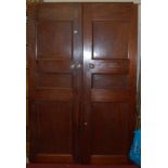 A pair of early 20th century mahogany three panelled interior doors, each 196 x 66cm