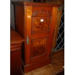 A late Victorian walnut and figured walnut single door bedside cupboard, w.41cm