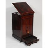 A 19th century rosewood and brass strung travelling lectern, having hinged top over a four panel