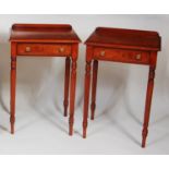 A pair of figured walnut and inlaid lamp tables, each having a crossbanded top, single frieze