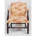 A late 19th century mahogany framed Gainsborough armchair, in the mid-18th century style, having