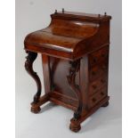 A Victorian figured walnut piano top Davenport, the top with secret rise-and-fall on sprung