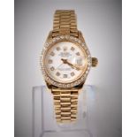 A lady's Rolex Oyster Perpetual Datejust wristwatch set with diamonds, the white dial with diamond