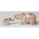 A modern silver elephant, naturalistically modelled, 3.3oz, maker A.C. Co, London 1968, h.4.5cm;