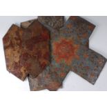 Three embossed leather panels , probably late 17th/early 18th century, each in the form of a