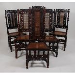 A matched set of six Caroleon period chairs, in walnut and fruitwoods, each with split cane backs