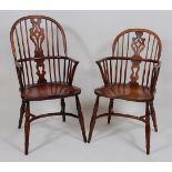 A set of ten elm and ash Windsor chairs, each having pierced vase splatbacks, dished seats, and on