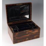 A Victorian calamander fitted toilet box by Asprey, the whole being brass bound and strung,