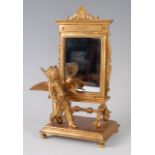 A 19th century French gilt bronze dressing table mirror, the rectangular plate in the form of an