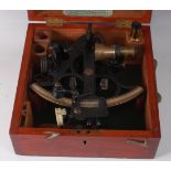 A mid-20th century Husun black lacquered and brass triple ring sextant no. 44077 by Henry Hughes &