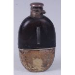 A Victorian glass bodied and leather clad pocket hip flask, having silver plated mount and