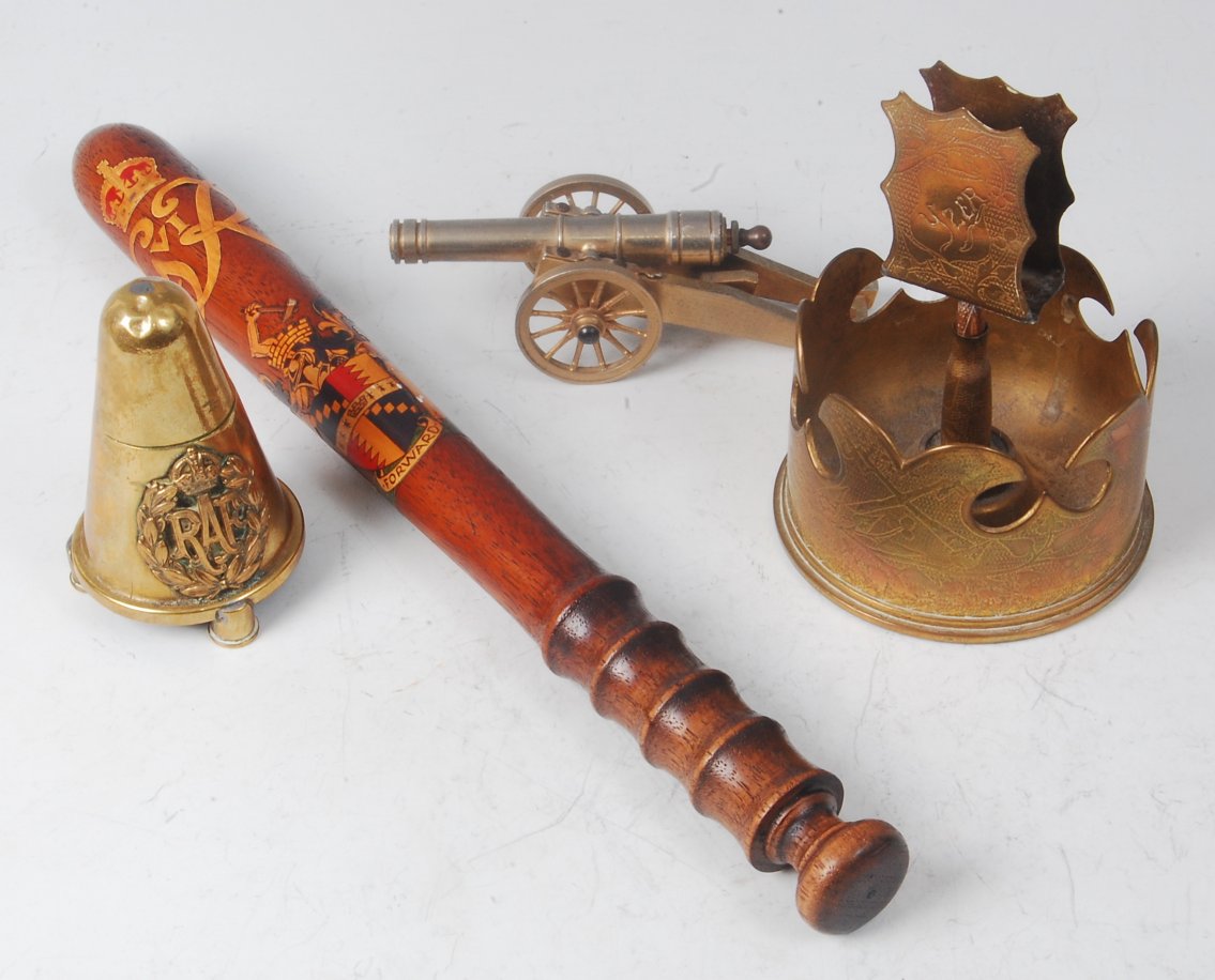 A trench art table cigarette lighter, having applied R.A.F. badge, together with a trench art