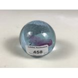 A Caithness Pastel glass paperweight