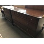 Three items of Stag bedroom furniture including a chest of drawers, 107 x 47 x 71 cm, one other